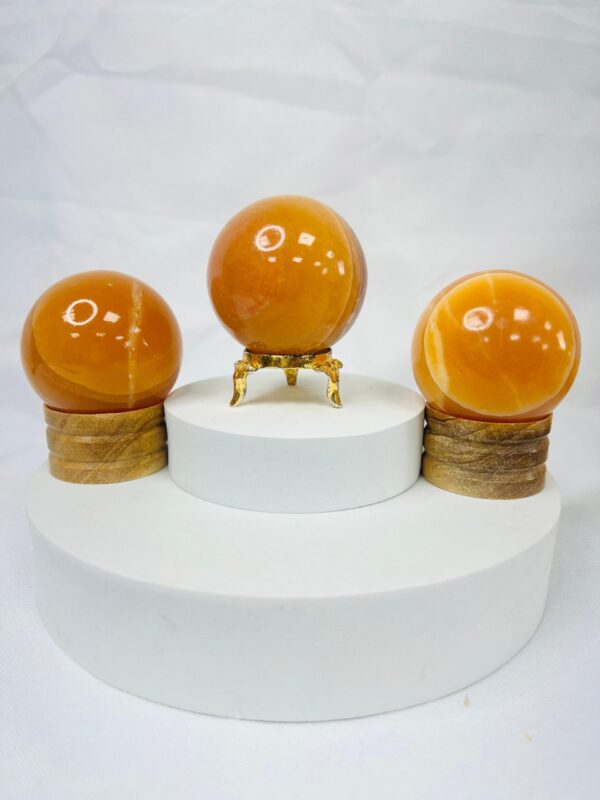 Orange calcite crystal sphere 40mm