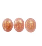 Rose quartz zibu coin